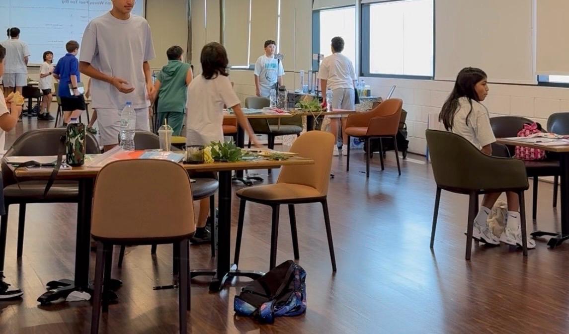 Kids working together at a Transformation Avenue life-skills workshop in Dubai